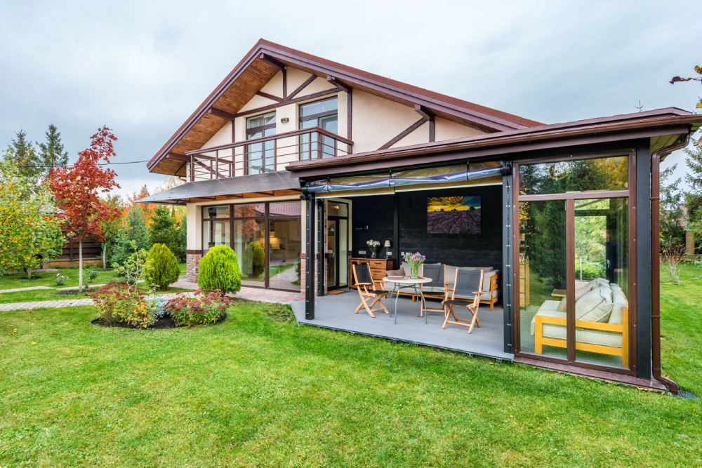 Maintained backyard lawn and garden with a covered outdoor entertaining area.
